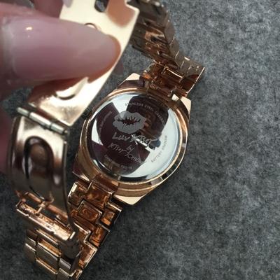 Betsey Johnson rose, gold puppy, dog watch