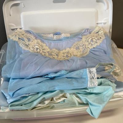 Small tote of vintage silky nightgowns