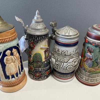 4 taller beer steins