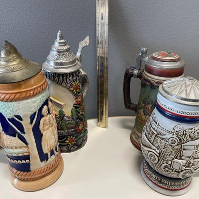 4 taller beer steins