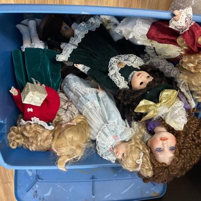 Blue tote of dolls