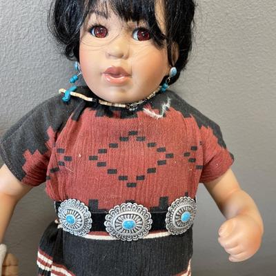 Blue tote of dolls