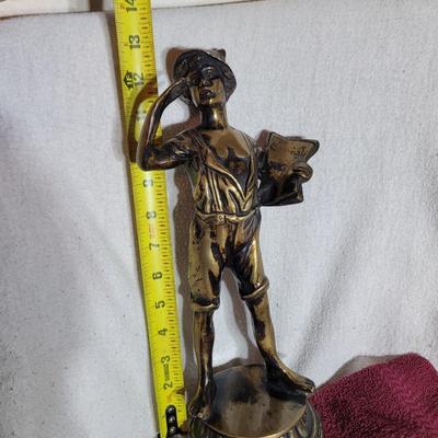 Bronze sculpted paperboy