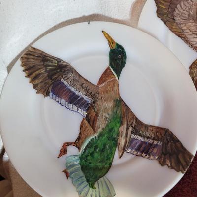 3 hand painted plates and 1 Eisenhower plate
