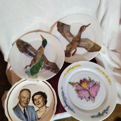 3 hand painted plates and 1 Eisenhower plate