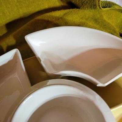 Relish tray with center dip bowl on lazy susan