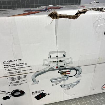 Dovall Outdoors Automatic Play Pigeon Thrower NEW in the Box.