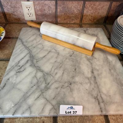 Large marble & small round marble cutting board & rolling pin on wood stand