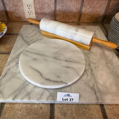 Large marble & small round marble cutting board & rolling pin on wood stand