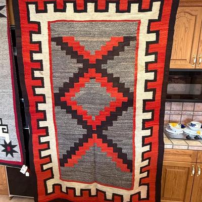Large orange/Tan/Gray/Brown native Navajo print Rug