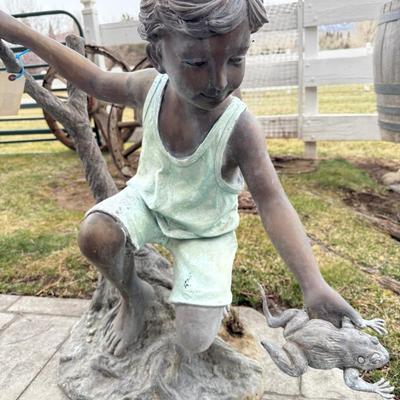 Bronze small child w/frog 30” h x 32”w Statue