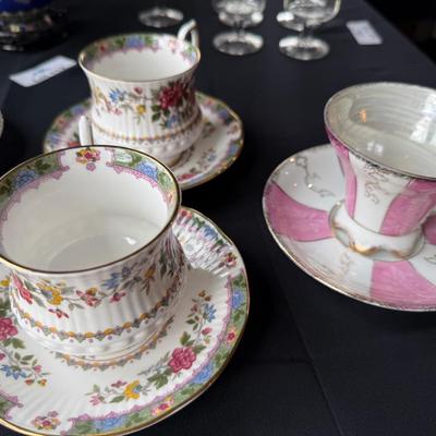 assortment of 7 ceramic teacups & matching saucers