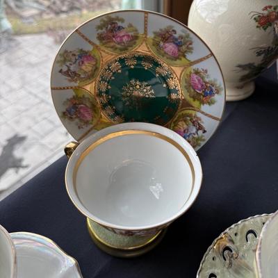 assortment of 7 ceramic teacups & matching saucers