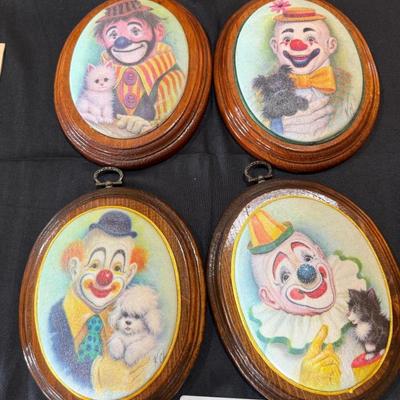 Set of 4 wood backed ceramic Clown wall hangings