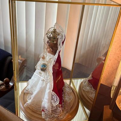 Religious themed Doll in mirrored back Display