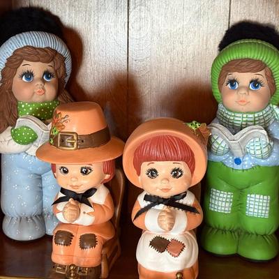 4 Ceramic dolls - 2 Pilgrim themed & 2 winter themed