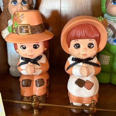 4 Ceramic dolls - 2 Pilgrim themed & 2 winter themed