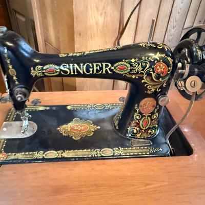 Singer Sewing Machine in wooden cabinet