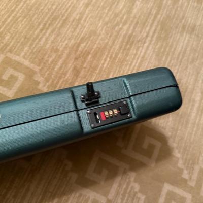 Green locking Holland & Holland shotgun case