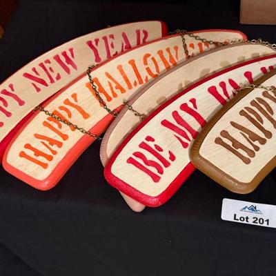 Curved Holiday themed hanging wooden signs