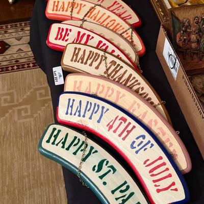 Curved Holiday themed hanging wooden signs