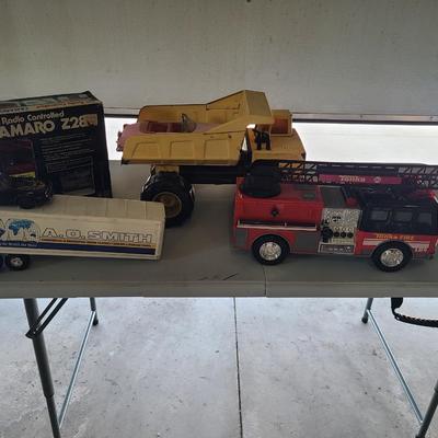 Sale Photo Thumbnail #31: Will receive everything pictured as is. 

Firetruck and Yellow Loader are both Tonka.