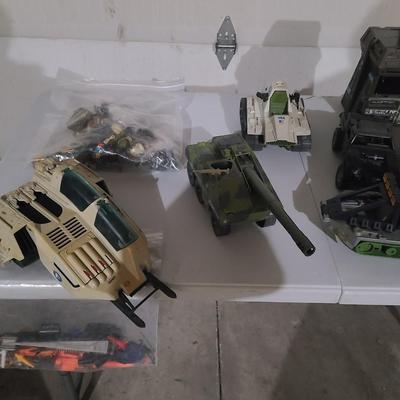 Sale Photo Thumbnail #42: Different GI Joe vehicles and characters. The lot will ship as is with everything pictured included.
