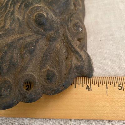 Figural Cast Iron Embossed Cherub