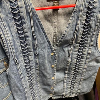 Tote Multiple pairs of ladies jeans and Jean vests
