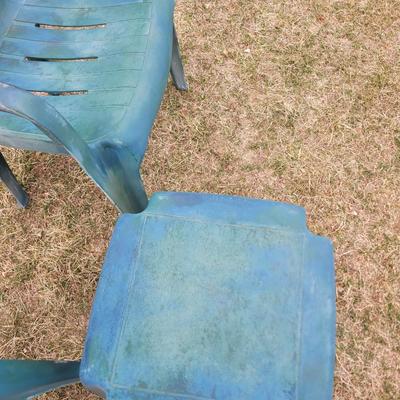 2 patio chairs, table, 2 angels and a cherub