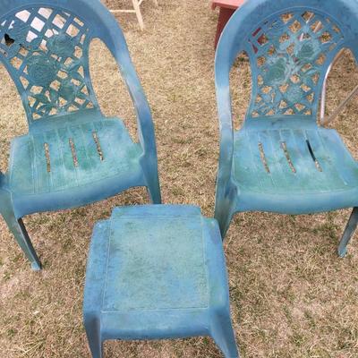 2 patio chairs, table, 2 angels and a cherub