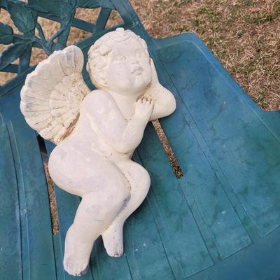 2 patio chairs, table, 2 angels and a cherub