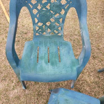 2 patio chairs, table, 2 angels and a cherub