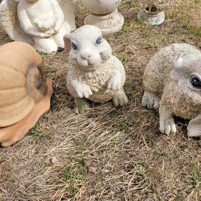 Clay garden rabbits and snail