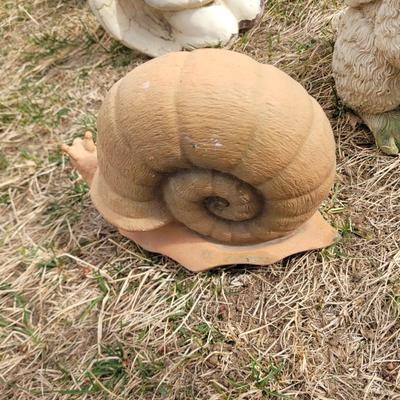 Clay garden rabbits and snail