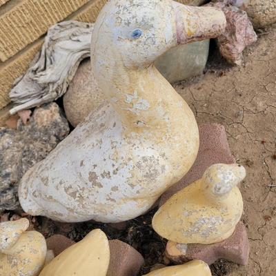 Concrete ducks and 3 babies