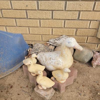Concrete ducks and 3 babies