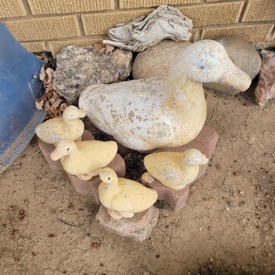 Concrete ducks and 3 babies