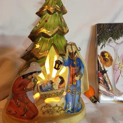 Lighted nativity scene and candy dish
