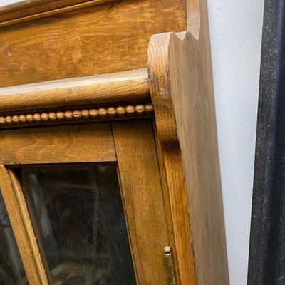 vintage bookcase with glass doors, beaded wood