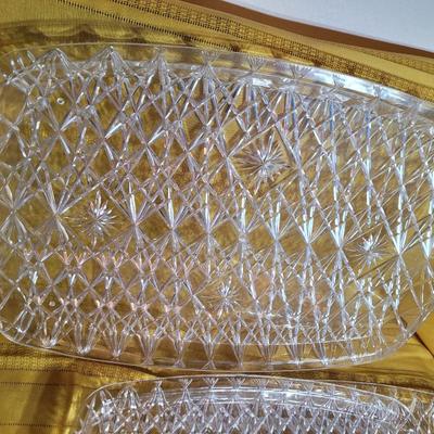 3 serving trays and a crystal based cake presenter