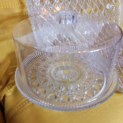 3 serving trays and a crystal based cake presenter