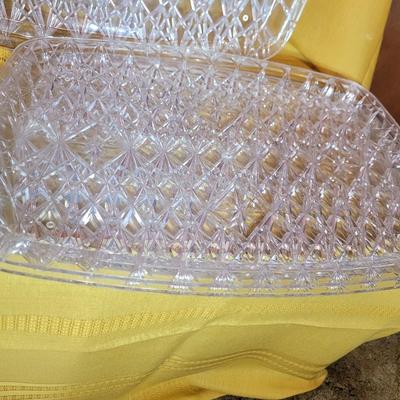 3 serving trays and a crystal based cake presenter