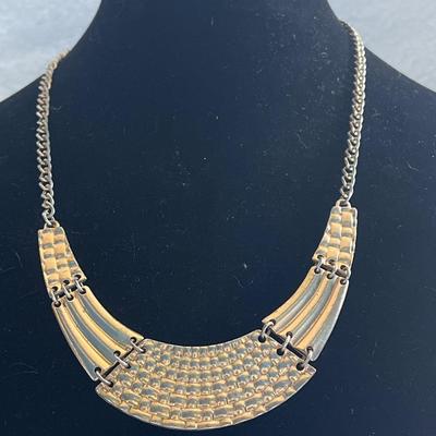 Silver toned chain with gold tones necklace