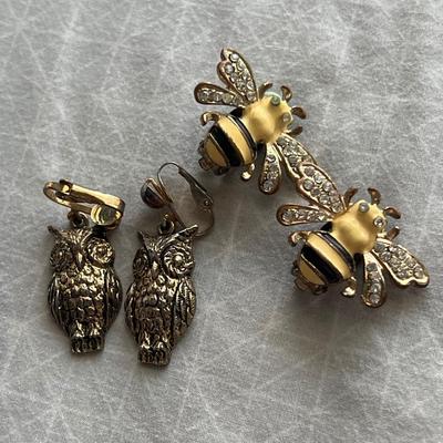 Gold toned animal shaped clip on earrings