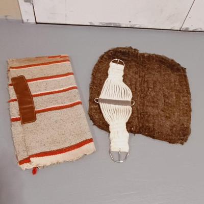 SADDLE BLANKET, WOOL SADDLE PAD AND A CINCH