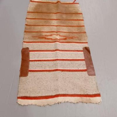 SADDLE BLANKET, WOOL SADDLE PAD AND A CINCH