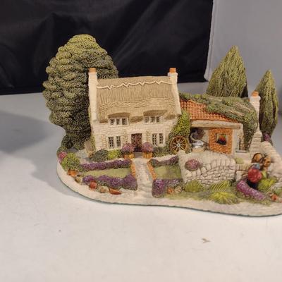 Pair of Cottage Figurines- One is Musical