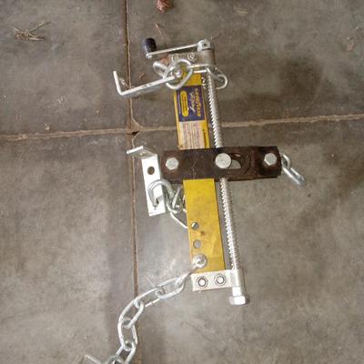 Cherry picker leveler