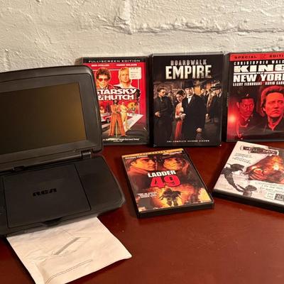RCA Portable DVD Player w/ DVDs